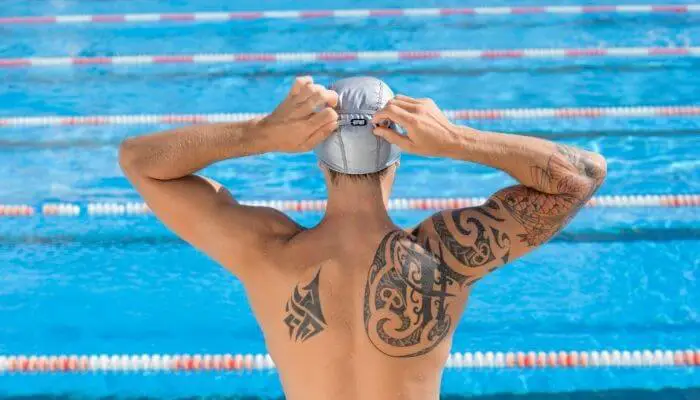 Can you saran wrap a tattoo to swim