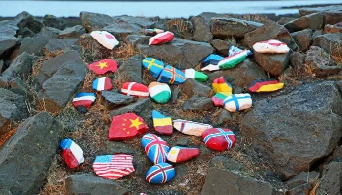 rocks painted with national flags