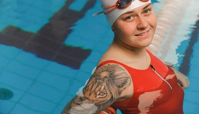 swimmer with a tattoo